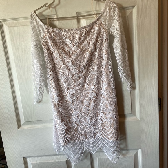 white lace dress with tan underneath